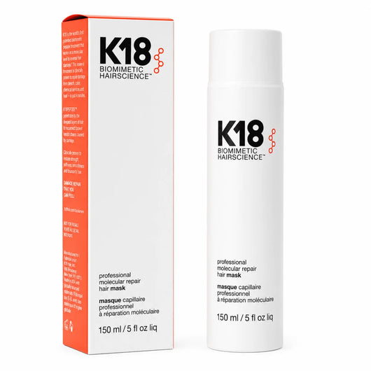 K18 Biomimetic Hairscience Leave-in-Haarmaske in einer weißen Flasche neben der Produktverpackung
