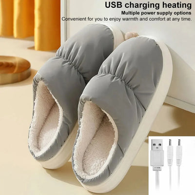 USB-beheizbare Hausschuhe mit Plüschfutter und USB-Ladekabel für warme Füße zu Hause oder im Büro.