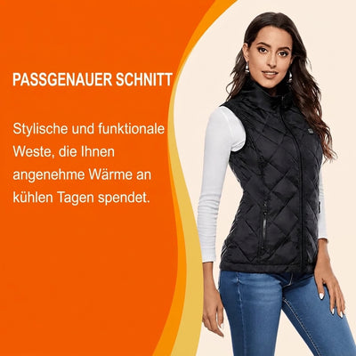 Eine Frau trägt eine schwarze, figurbetonte beheizbare Weste, die für Komfort und Wärme an kühlen Tagen sorgt.