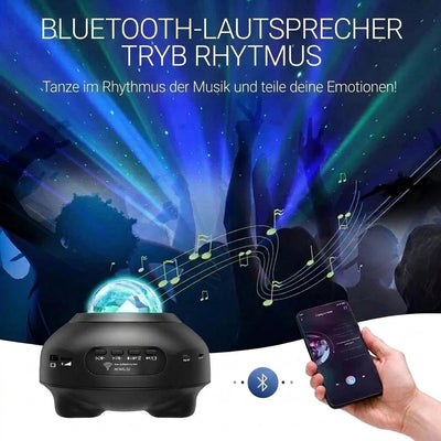 Nordlichtprojektor mit Bluetooth-Lautsprecher im Rhythmus-Modus, gesteuert über ein Smartphone bei einer Party.
