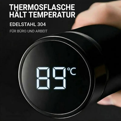 Schwarze Thermosflasche aus Edelstahl mit digitaler LED-Temperaturanzeige, die 89 Grad Celsius anzeigt.