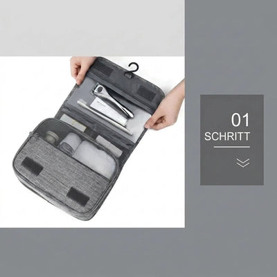Offene, graue Kosmetiktasche zum Aufhängen mit verschiedenen Fächern für Reiseutensilien, Schritt 1 der Anleitung.